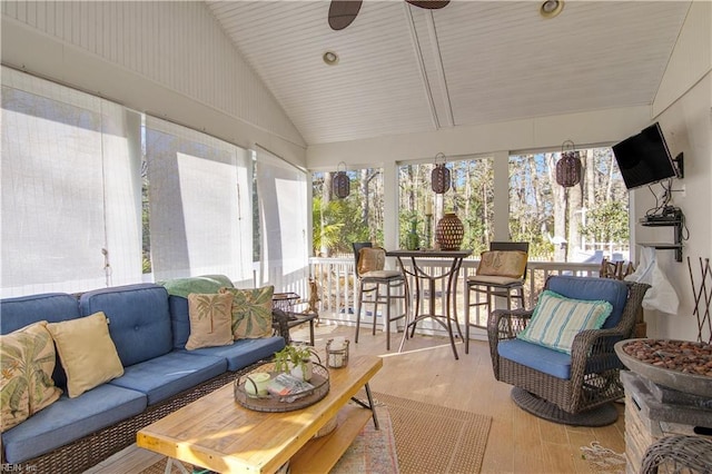 exterior space featuring an outdoor living space and ceiling fan