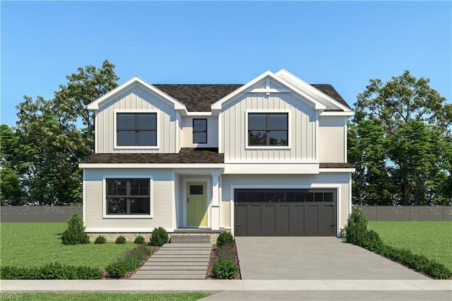 view of front of house with a garage and a front lawn