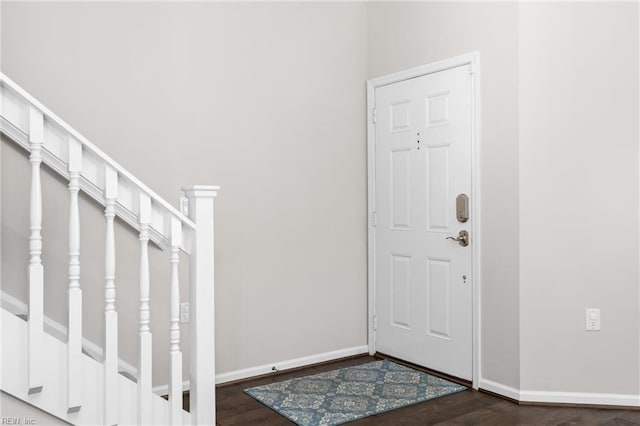 entrance foyer with dark hardwood / wood-style flooring