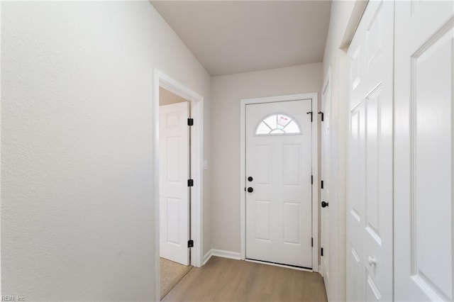 doorway featuring light wood-type flooring