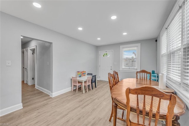 dining area with light wood-type flooring