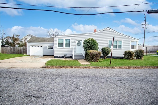 view of front facade featuring a garage and a front yard