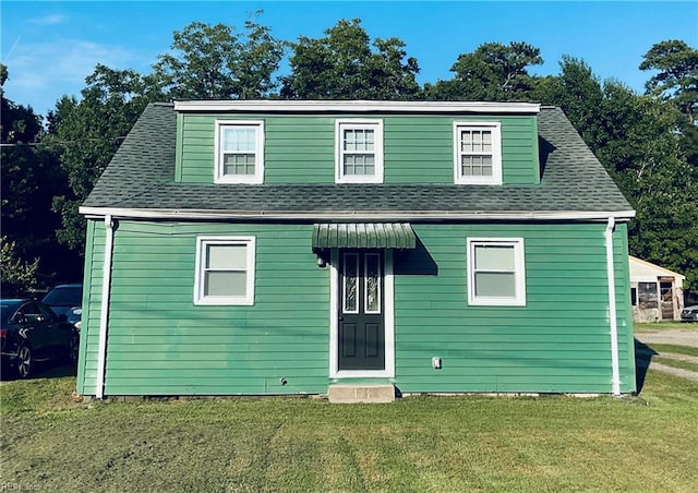 view of front of home featuring a front lawn