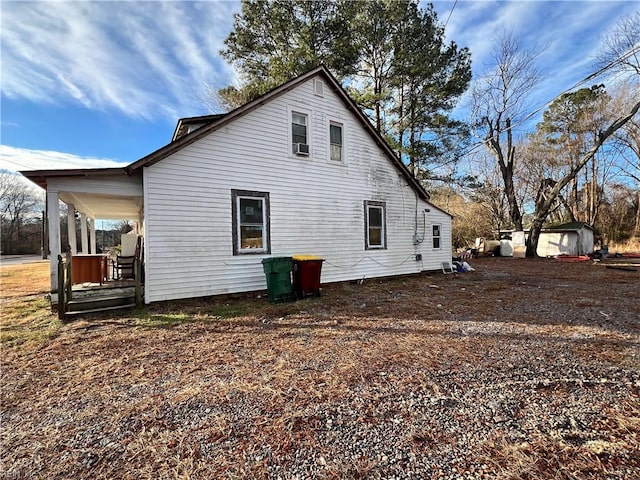 back of house with covered porch