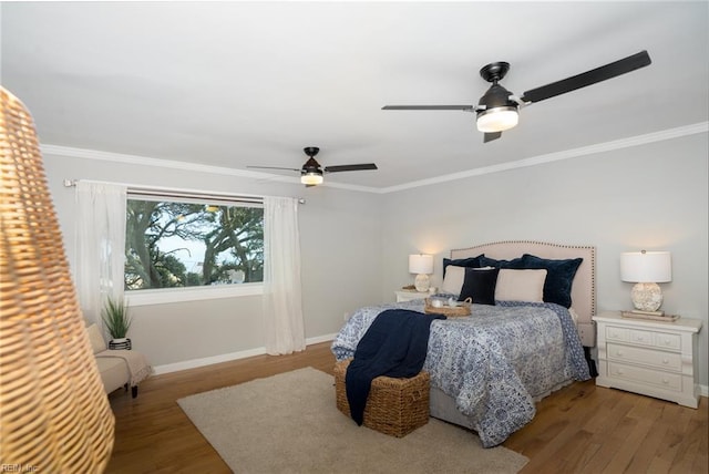 bedroom featuring ornamental molding and light wood-type flooring