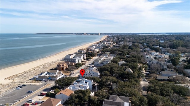 aerial view featuring a water view and a beach view