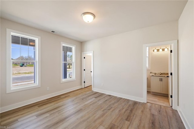 empty room featuring light wood-type flooring