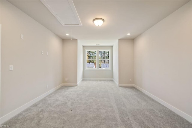 spare room with light colored carpet