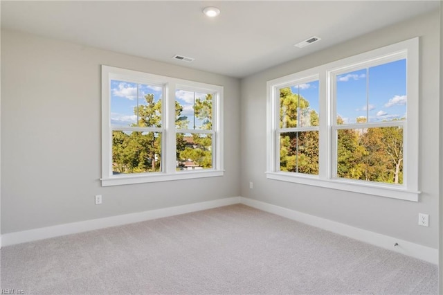 spare room with carpet flooring