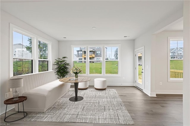 sitting room with dark hardwood / wood-style floors