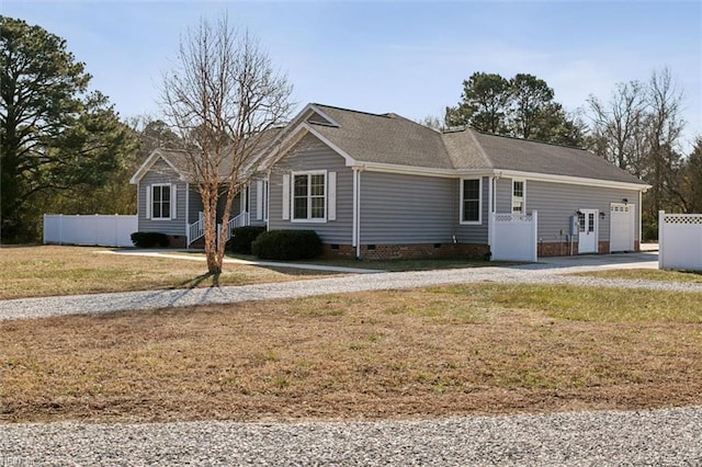 single story home featuring a front lawn