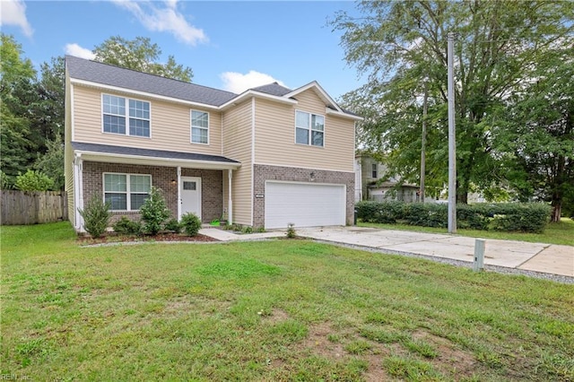 view of front of home with a garage and a front yard