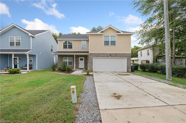 view of front of home with a garage and a front lawn