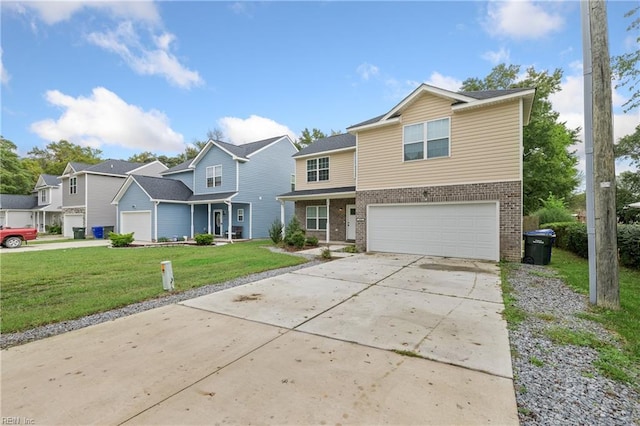 view of front of property featuring a garage and a front yard