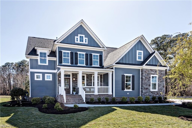 craftsman-style home featuring a front yard and a porch