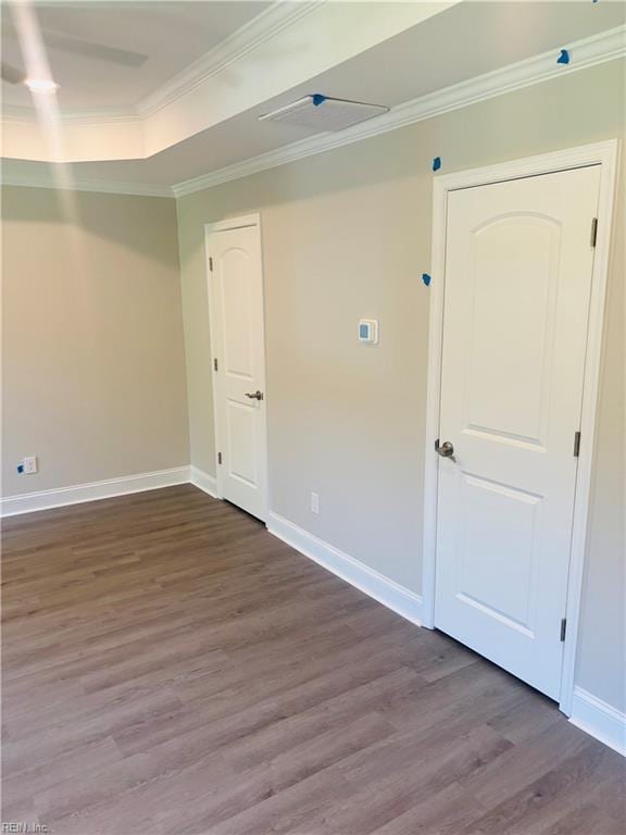2084 Millville Rd, Chesapeake, VA 23323 - empty room with wood finished floors, ornamental molding, and a tray ceiling
