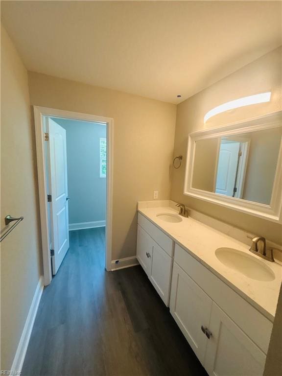 2084 Millville Rd, Chesapeake, VA 23323 - bathroom with double vanity and wood finished floors