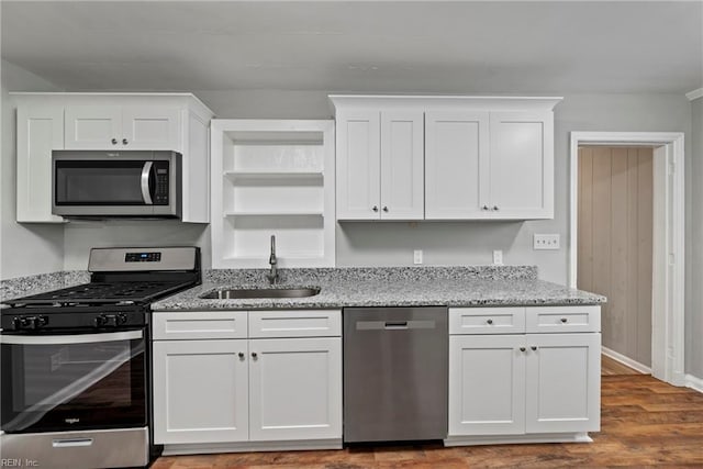 kitchen with white cabinetry and appliances with stainless steel finishes