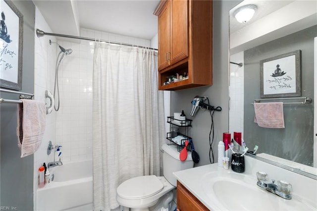 full bathroom with shower / bath combo, vanity, and toilet