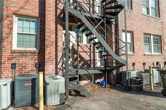 doorway to property with central AC unit