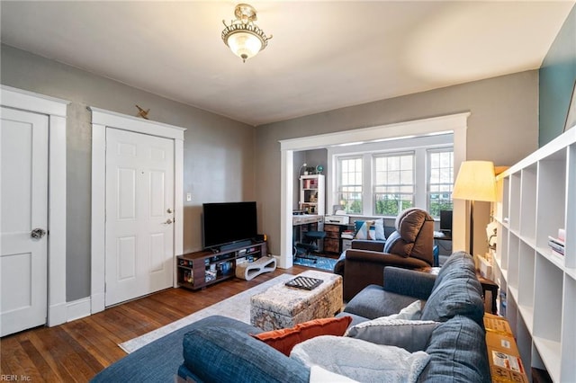 living room featuring dark hardwood / wood-style flooring