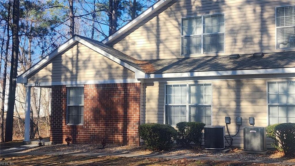 view of property exterior featuring cooling unit