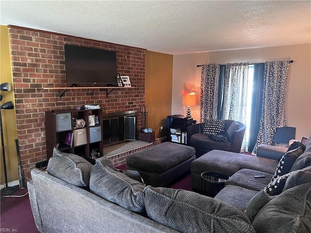 carpeted living room with a brick fireplace and a textured ceiling