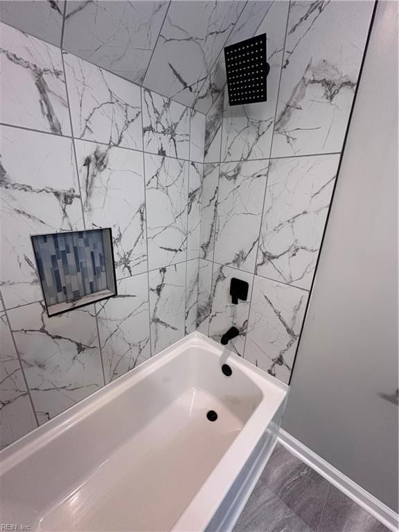 bathroom featuring shower / washtub combination