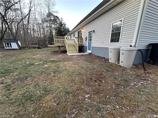 view of yard with a deck