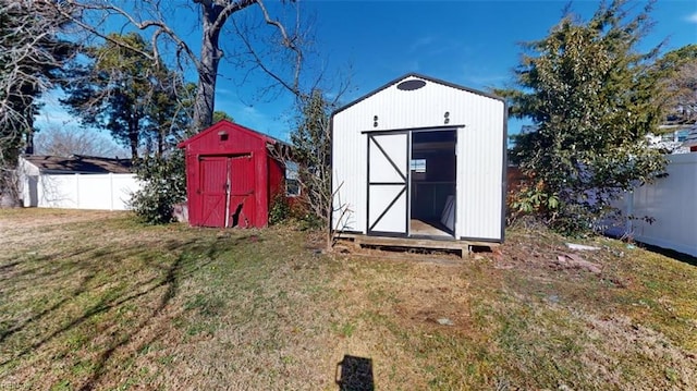 view of outdoor structure featuring a lawn