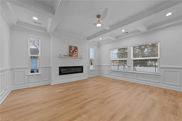 unfurnished living room with beamed ceiling, ceiling fan, coffered ceiling, and light wood-type flooring