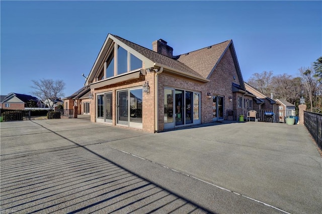 rear view of house featuring a patio area