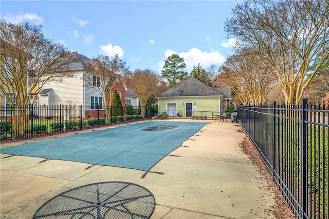 view of swimming pool with a patio