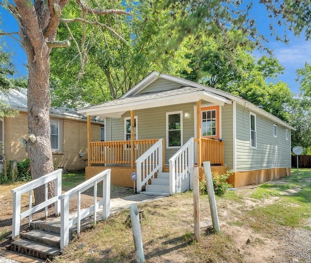 bungalow featuring covered porch