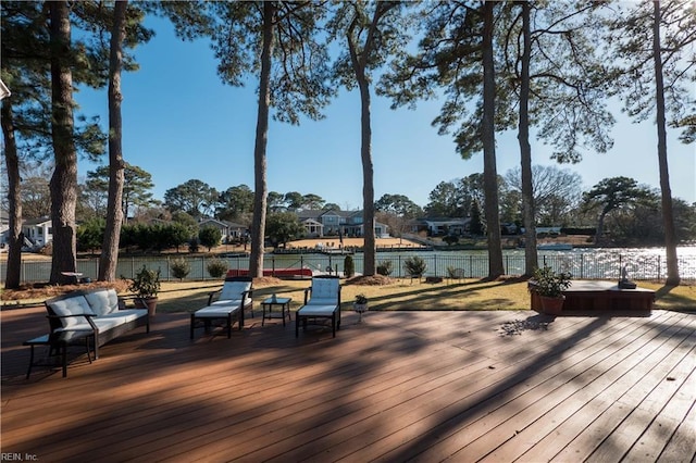 wooden terrace with a water view