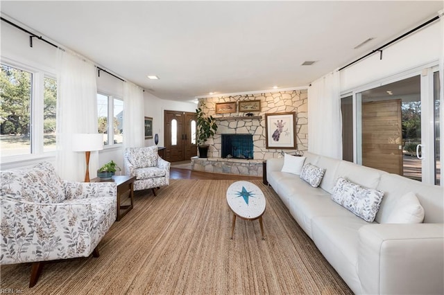 living room featuring a fireplace