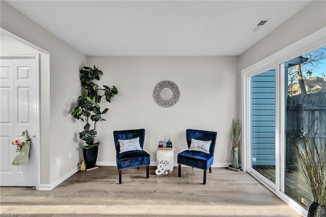 living area with light wood-type flooring