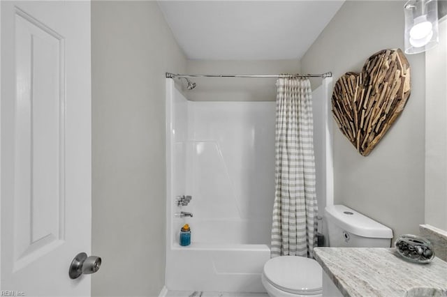 full bathroom with vanity, shower / bath combination with curtain, and toilet