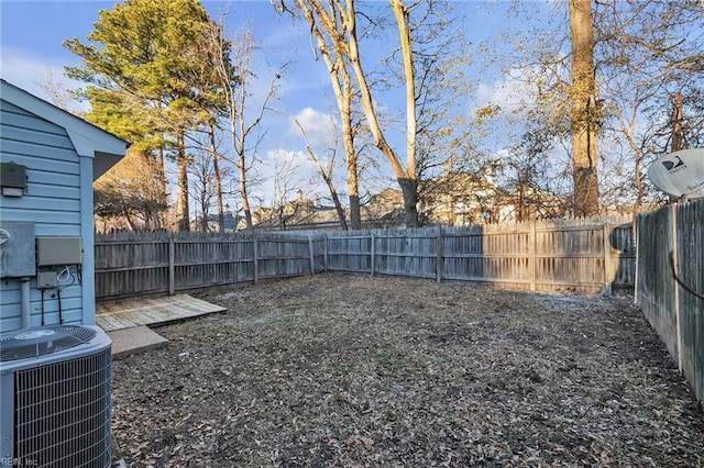 view of yard with central AC unit