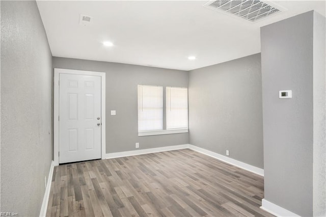 entrance foyer with light hardwood / wood-style floors