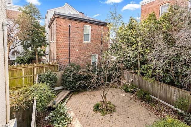 back of house with a patio area