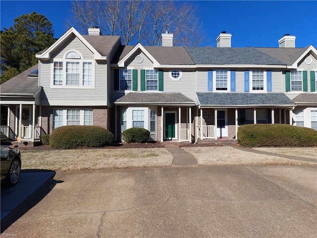 view of property with covered porch