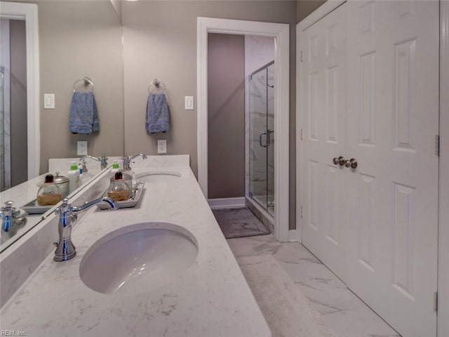 bathroom featuring vanity and an enclosed shower