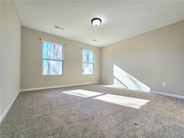 view of carpeted spare room