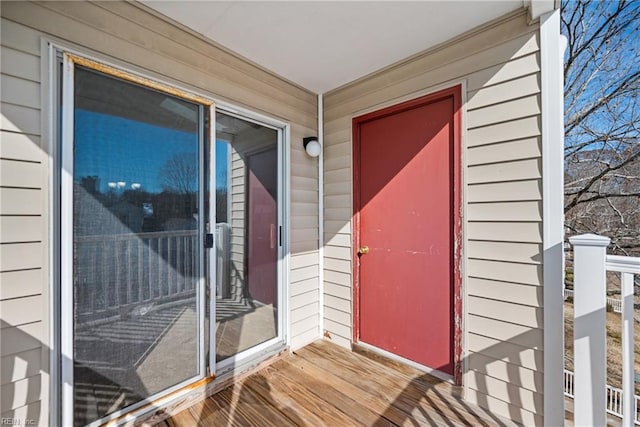 doorway to property featuring a balcony