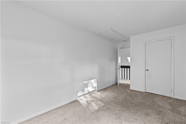 unfurnished room with carpet flooring