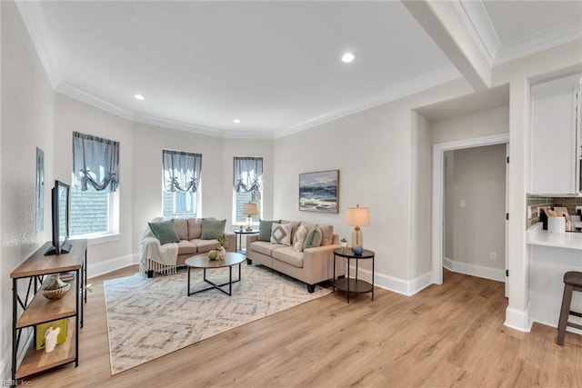 living room featuring light hardwood / wood-style flooring and ornamental molding