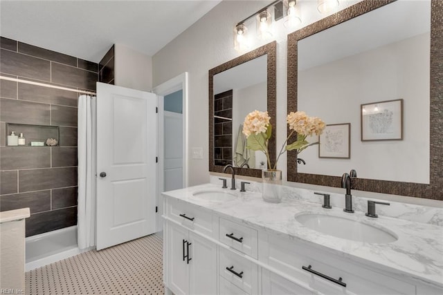 bathroom featuring a shower with curtain and vanity