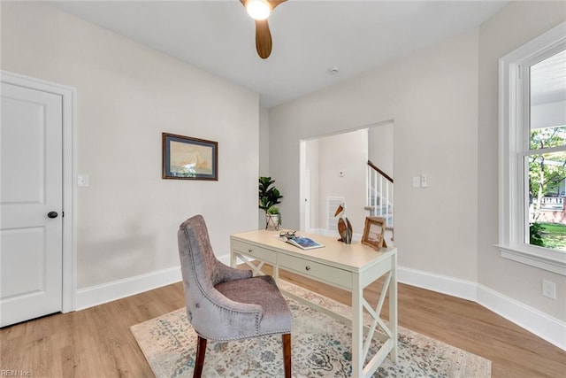 office area featuring ceiling fan and light hardwood / wood-style floors