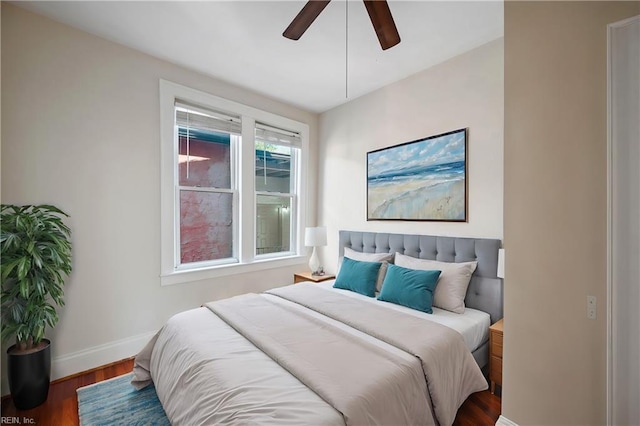 bedroom featuring hardwood / wood-style flooring and ceiling fan